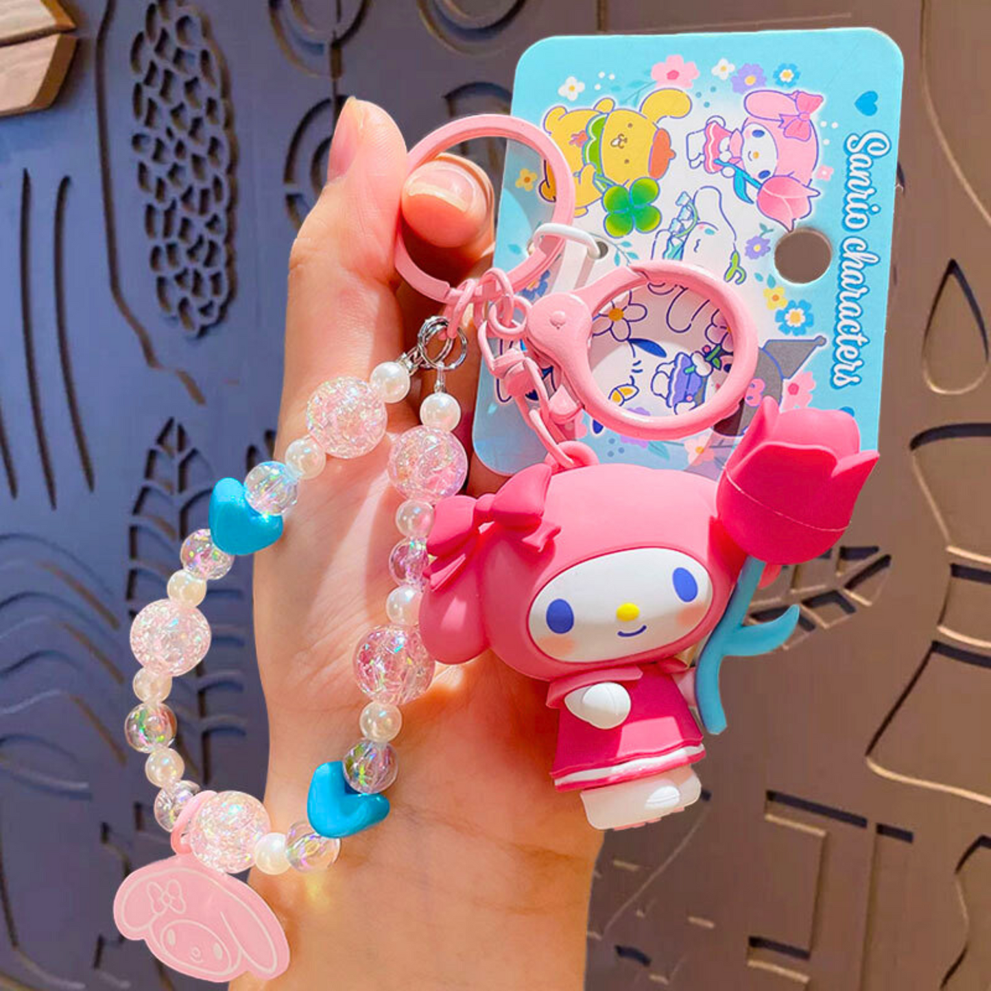 Sanrio - My Melody - Sleutelhanger – Tranquil Floral Serie – Schattig Sleutelaccessoire met Parelmoer Kralen – 7 cm – Perfect voor Tassen, Autosleutels & Cadeaus voor Kawaii Liefhebbers